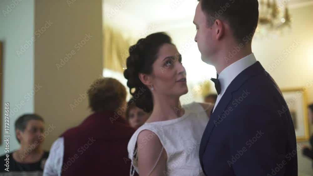 Bride and groom dancing waltz or slow dance in restaurant dance floor Bride and groom dancing waltz or slow dance in restaurant dance floor