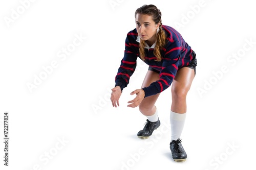 Full length of female rugby player in catching position © WavebreakMediaMicro