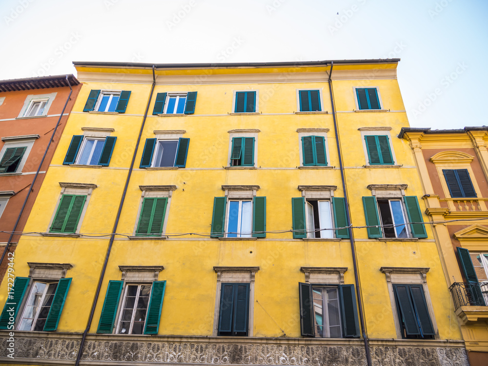 Beautiful Italian style buildings in the historic district of Pisa