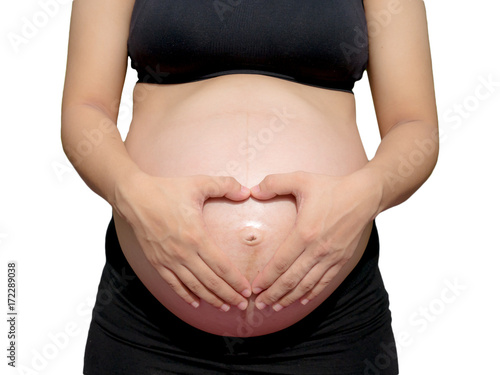 Pregnant woman exercising in the park