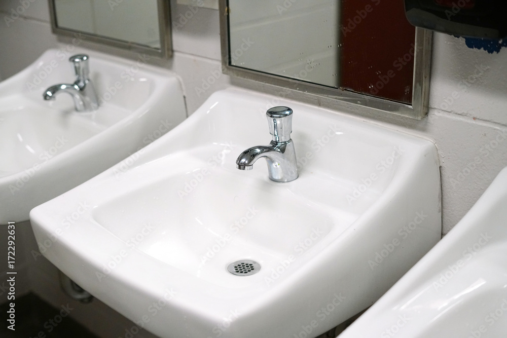 Close up on hand wash sink in the restroom Close up on hand wash sink in the restroom