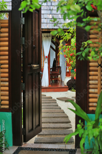 Alley leading to Asian house at resort