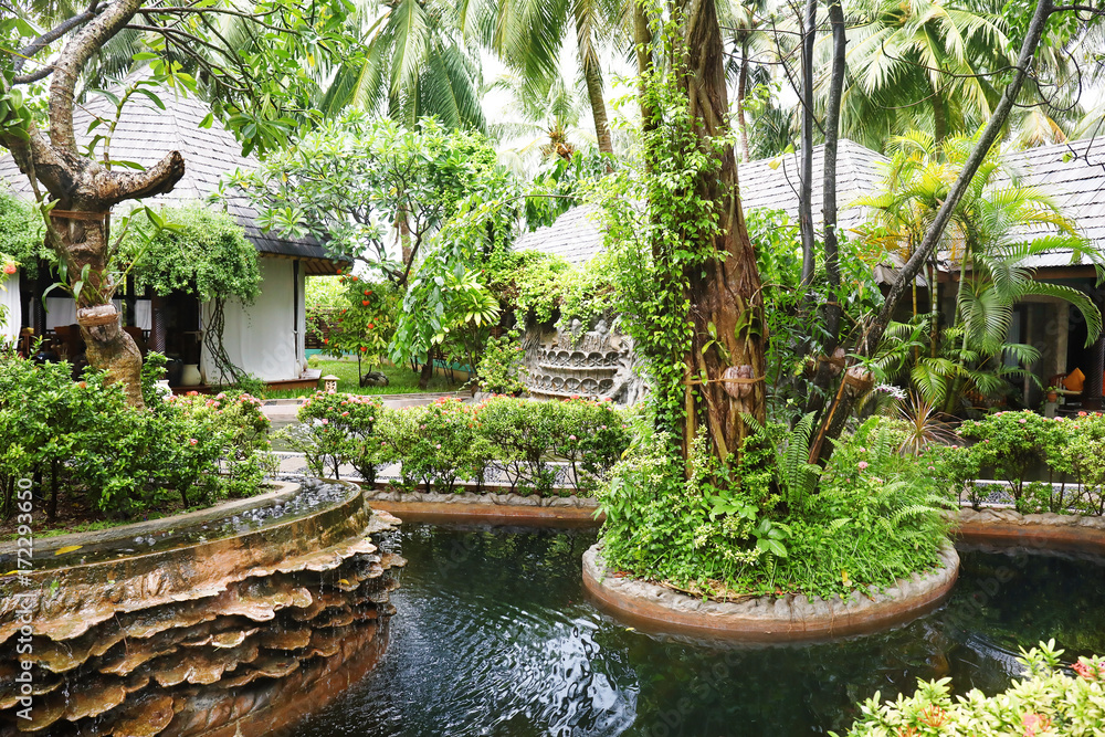 Fototapeta Beautiful garden at tropical resort