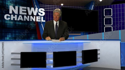 News Broadcaster Reads Copy in the Studio.