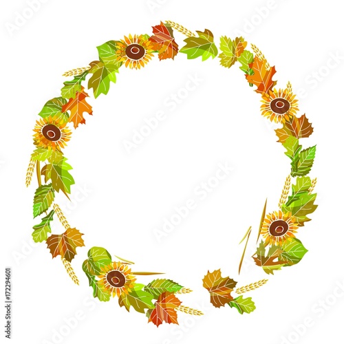 Autumnal wreath made of leaves, ripe sunflowers and spikes