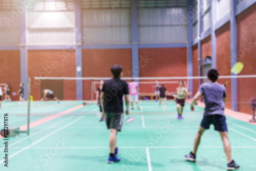 badminton court with blurred background woman playing badminton