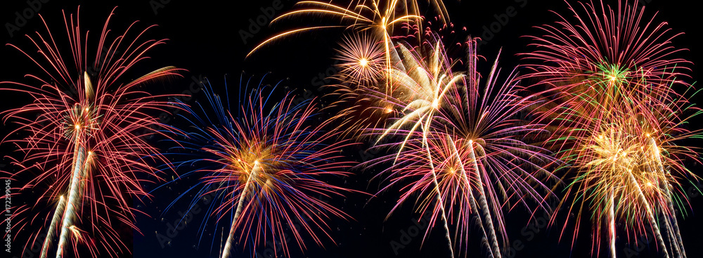 Beautiful fireworks display lights up the night time sky Beautiful fireworks display lights up the night time sky