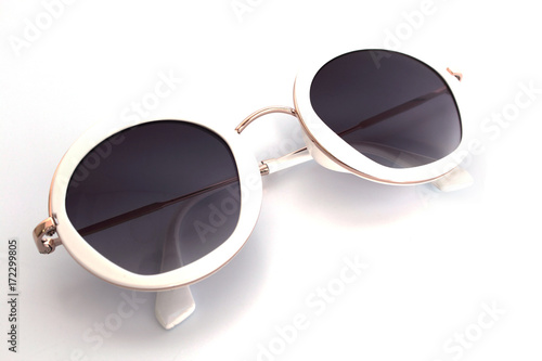 beautiful luxury white sunglasses isolated on white background