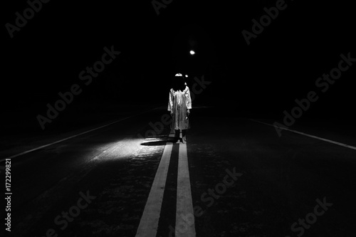 Mysterious Woman, Horror scene of scary ghost woman standing outdoor on street with light in white tone