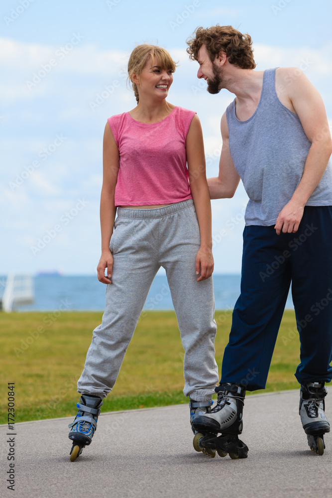 roller skater couple skating outdoor roller skater couple skating outdoor