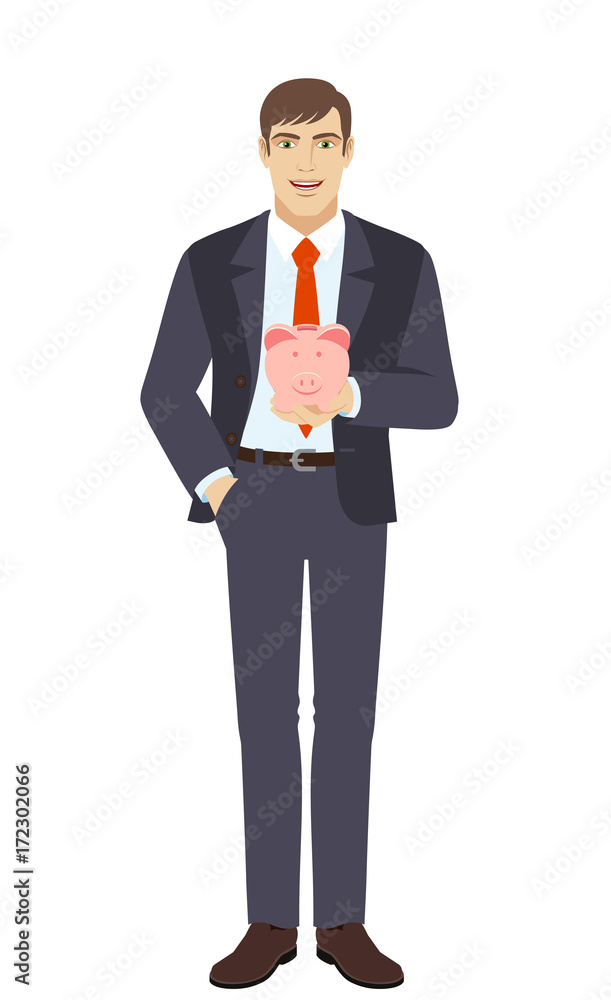 Businessman with hand in pocket with piggy bank Businessman with hand in pocket with piggy bank