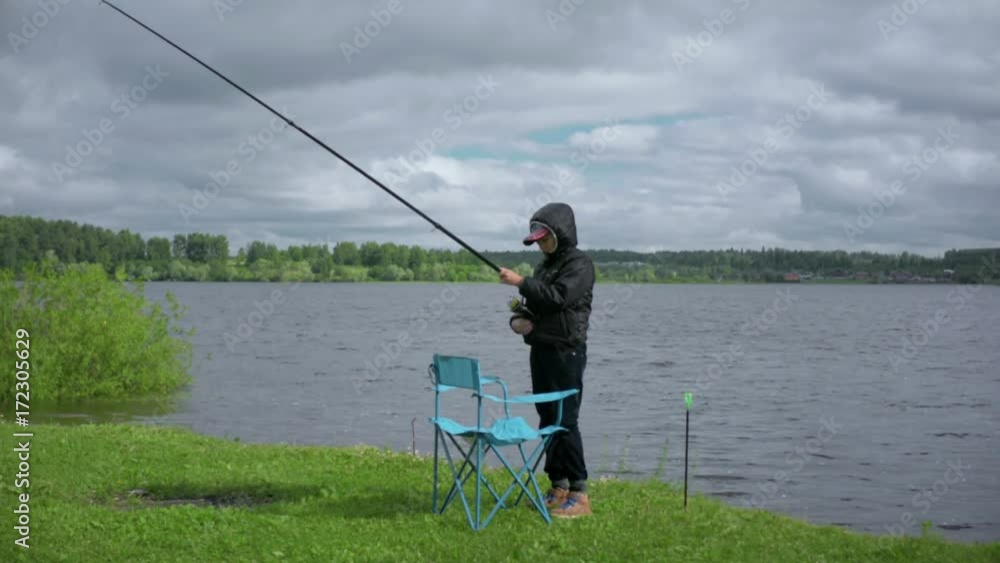 Children on fishing. Rest on the lake