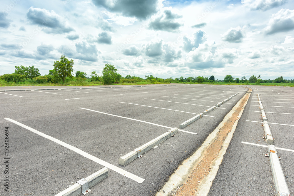 Empty parking lot against a beautiful blue sky Empty parking lot against a beautiful blue sky