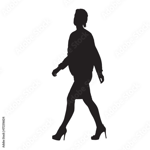 Business woman walking, side view. Vector silhouette
