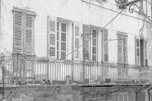 Old balcony in Entrevaux a village in the Haute Provence  France in black and white