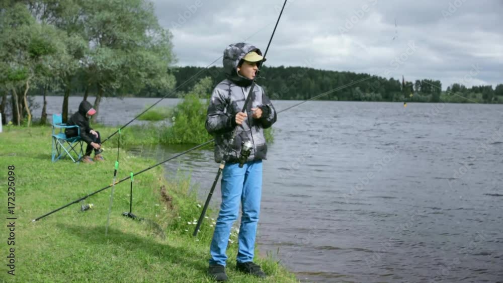 Children on fishing. Rest on the lake Children on fishing. Rest on the lake