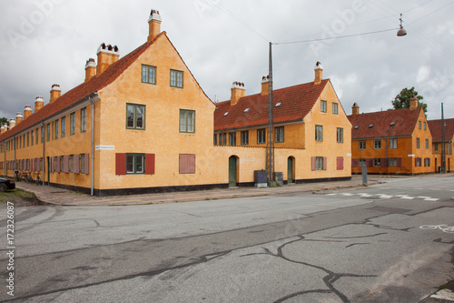 Exterior of Danish antique houses. Old buildings or public housing.