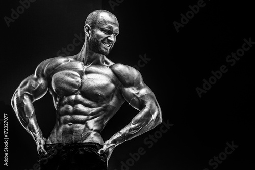 Photography Strong bald bodybuilder with six pack