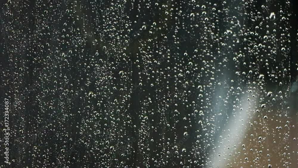 The Rain drifts down the window at night. The Rain drifts down the window at night.
