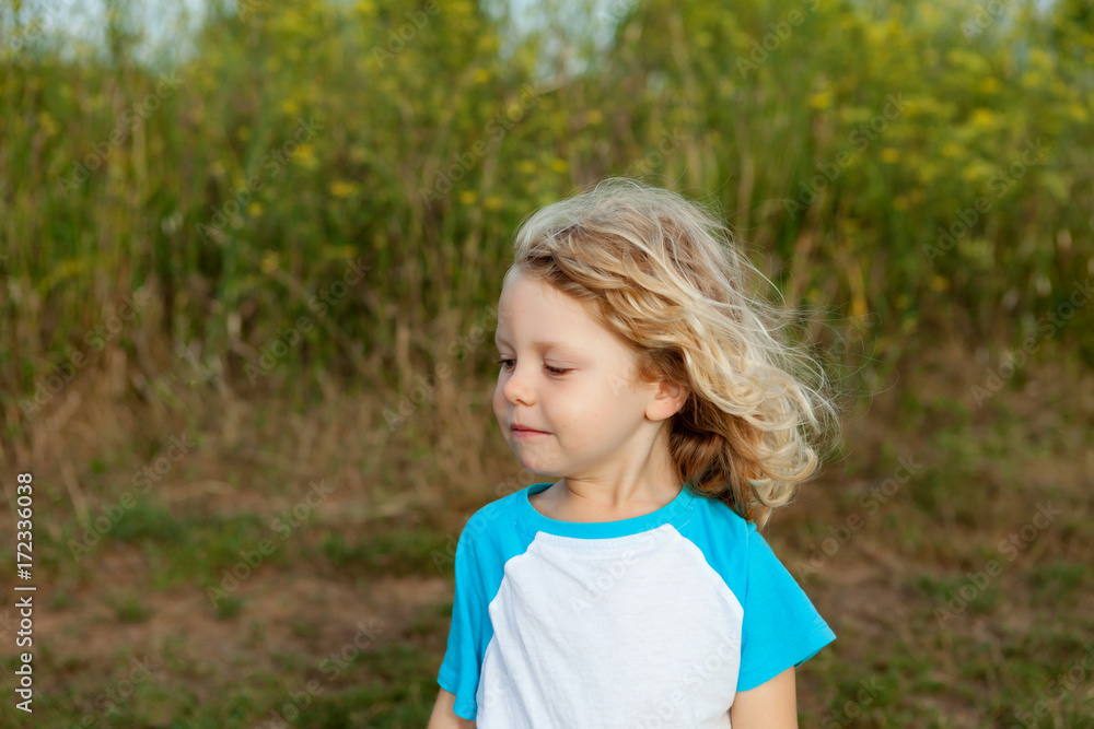 Small child enjoying of a sunny day Small child enjoying of a sunny day