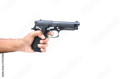 Fotografia hand hold gun on isolated