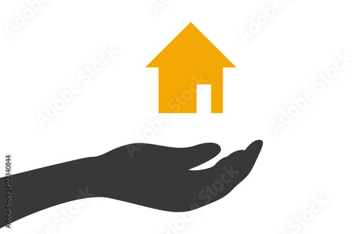 Hand hält Haus