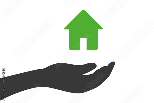 Hand hält Wohngebäude