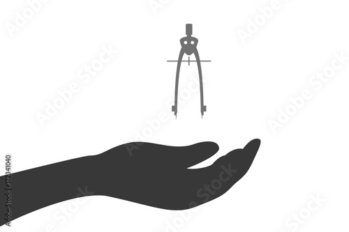 Hand hält Zirkel