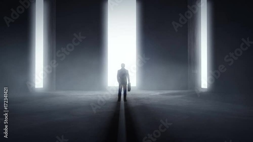Businessman standing in the front of three opening light tunnel entrances 