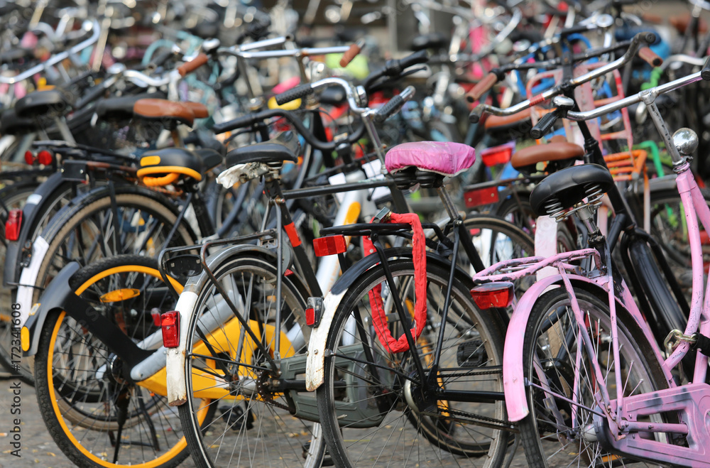 large parking lot with thousands of bikes in Amsterdam