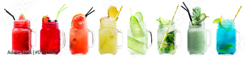 Obraz na plátně Set of classical fresh delicious smoothies and lemonades in a vintage mason jars with straws on light background