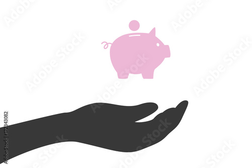 Hand hält Sparschweinchen