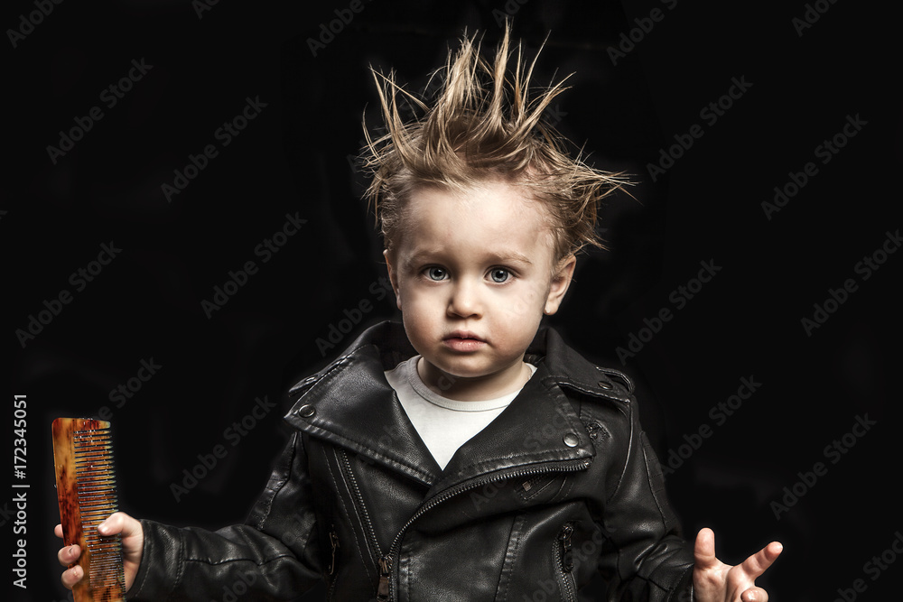 portrait of adorable young boy in leather jacket Stock Photo | Adobe Stock