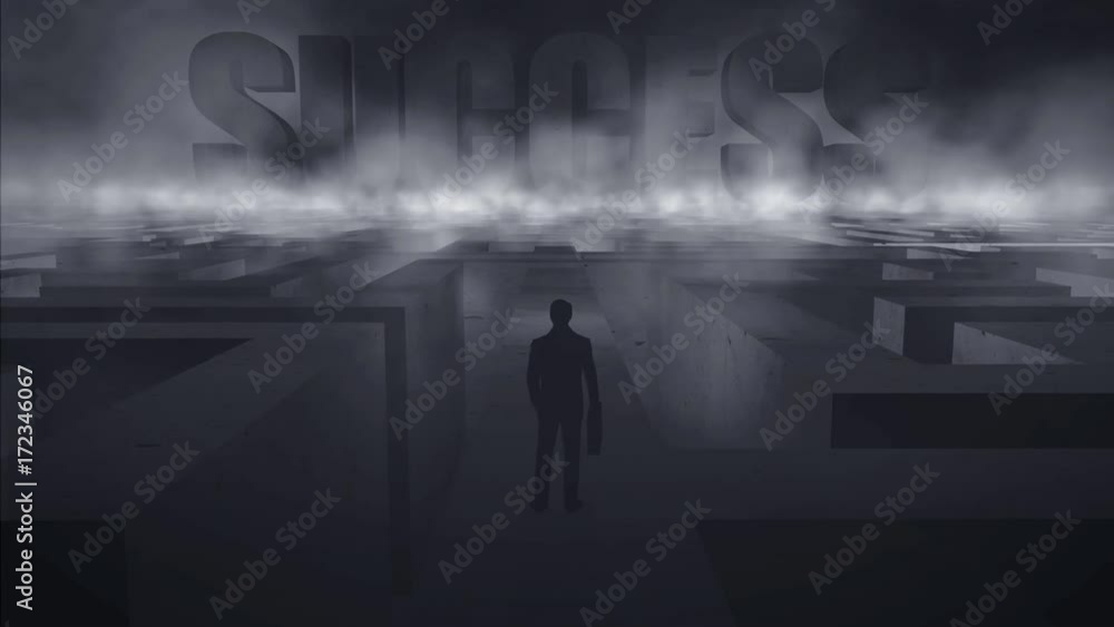 Businessman standing on the top of a labyrinth with text showing success in the background fog Businessman standing on the top of a labyrinth with text showing success in the background fog