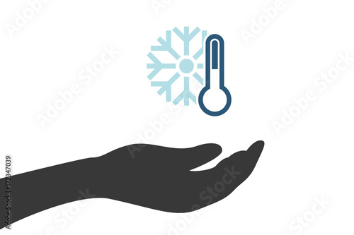 Hand hält Thermometer