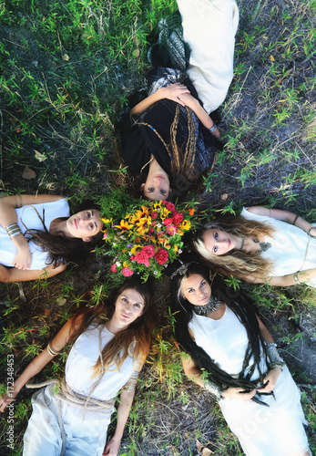 Gypsy Women lying on the grass