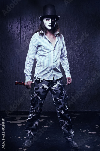 Tableau sur toile maniac in a mask with an ax