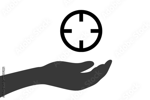 Hand hält Fadenkreuz