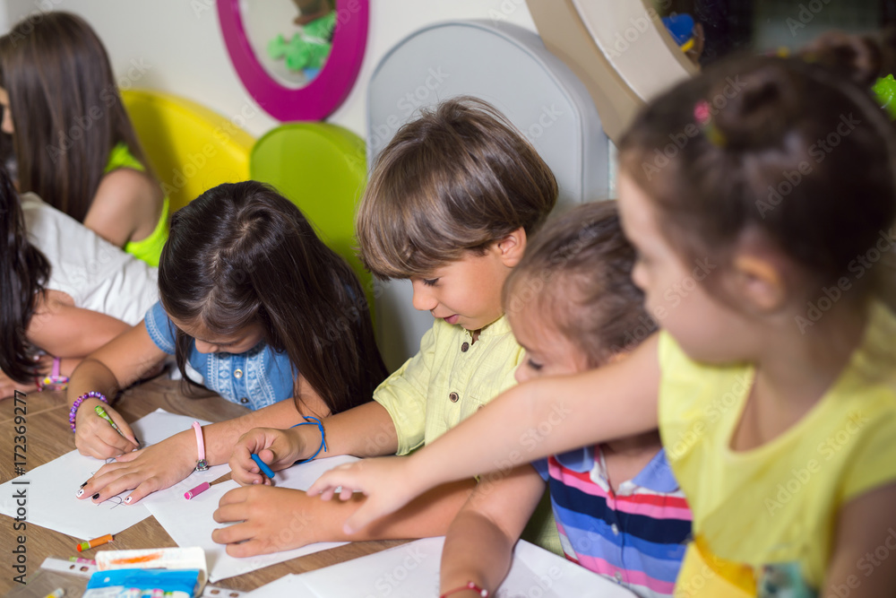 Fototapeta premium Children drawing on a class in a preschool.