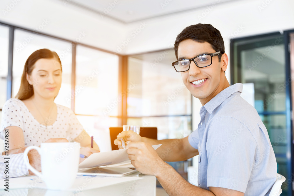 Young man in casual in office