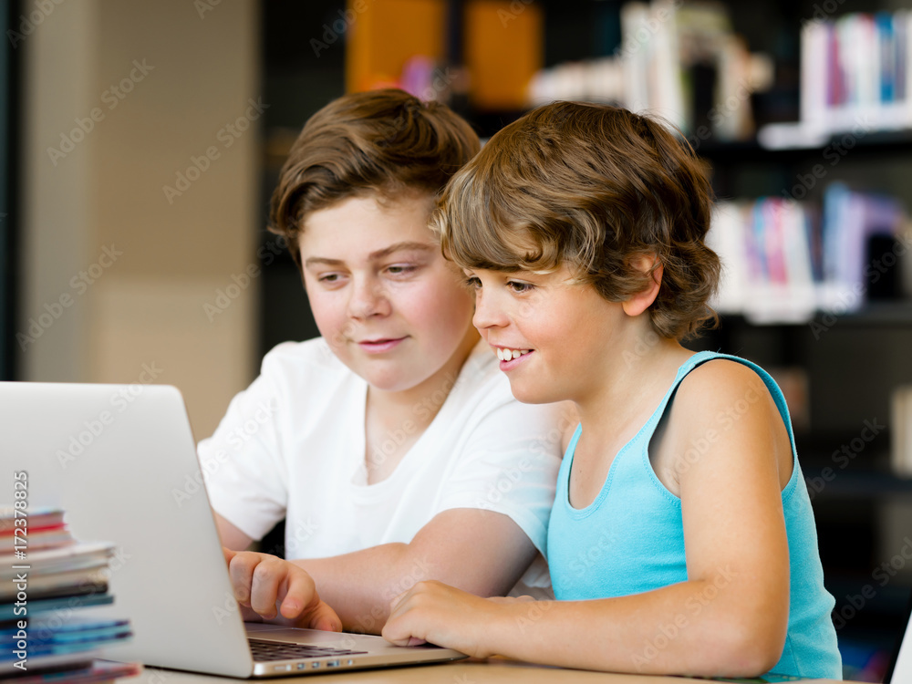 Two boys in library Two boys in library