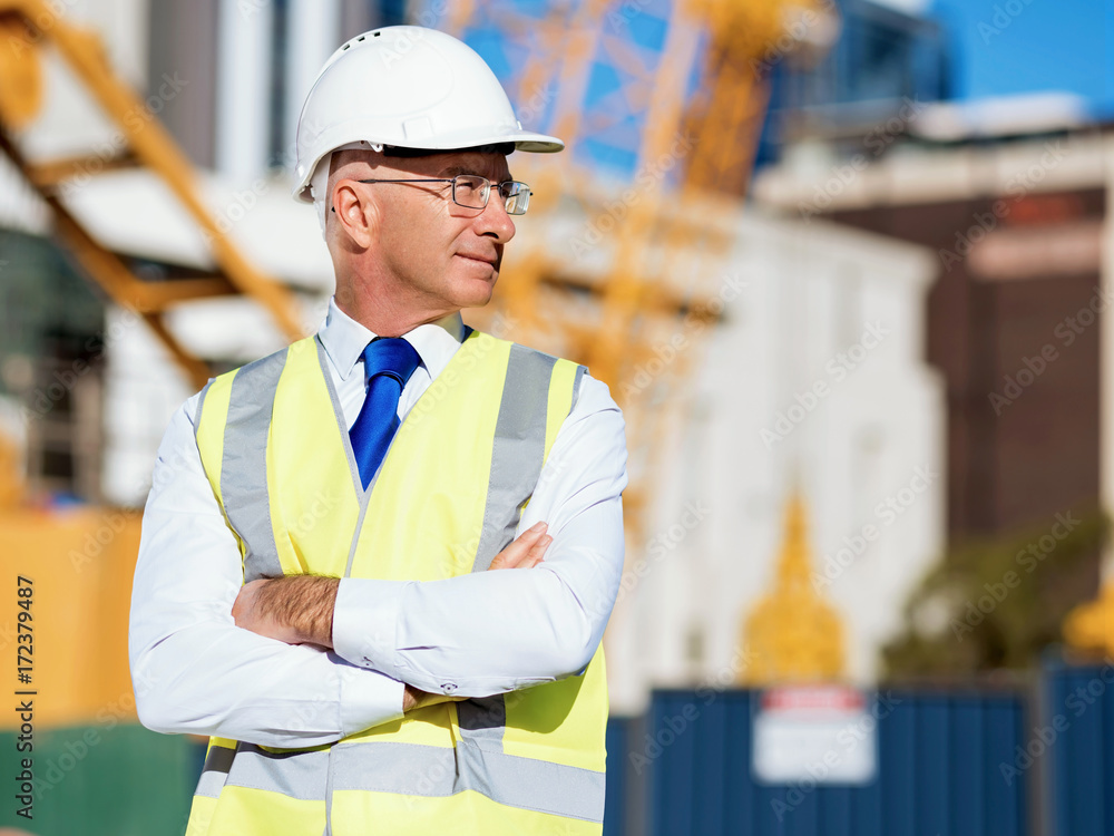 Engineer builder at construction site Engineer builder at construction site