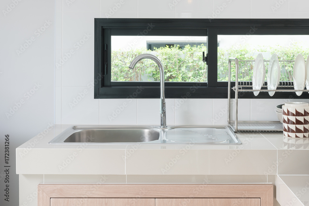 modern kitchen room with sink on counter modern kitchen room with sink on counter