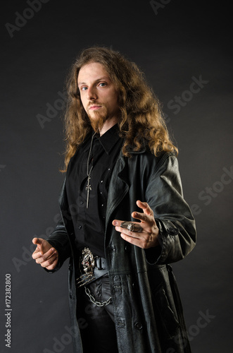 Cocky metalhead with long hair photo