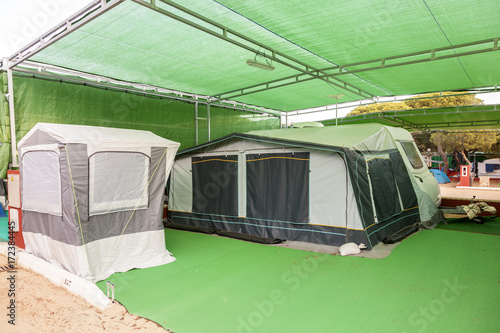 Caravan and tents at a campground photo