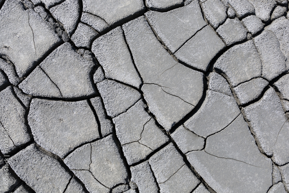 Obraz premium Cracks of the dried soil