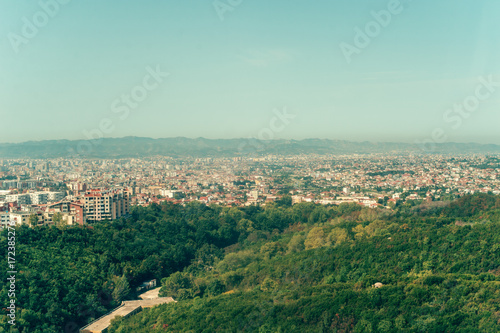 Aerial view to Tirana countryside old and new buildings. View from mountain Dajti. © allasimacheva