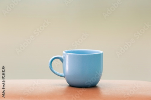 blue cup on the table