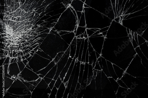 Top view cracked broken mobile screen glass texture background. © makibestphoto