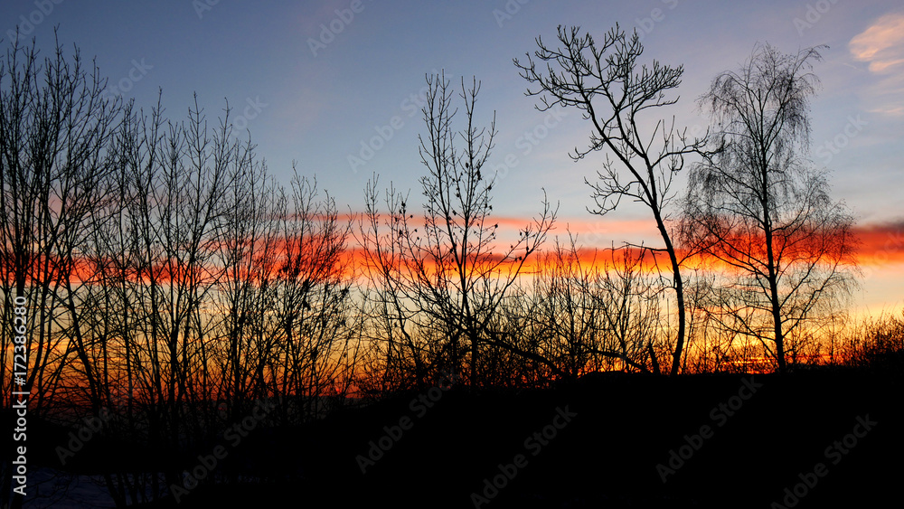 Obraz premium Tramonto in inverno